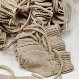 Petite Noé strikslofjes Merinowol sand